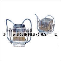 Silver Volumetric Liquid Filling Machine