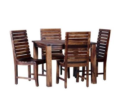 लकड़ी की नक्काशीदार डाइनिंग टेबल सेट