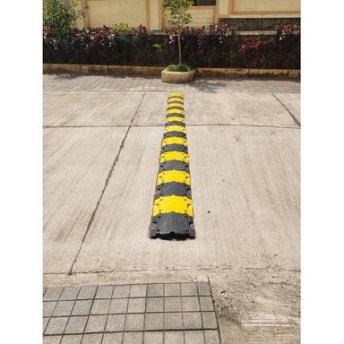 Yellow And Black Road Speed Breaker