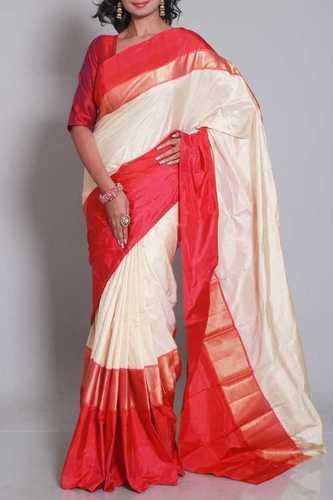 Cream Silk Ikat Saree With Red Border And Zari Highlights