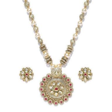 Gold Toned And Pink Kundan Jewellery Set