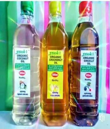 Common Coconut Oil In Plastic Bottle