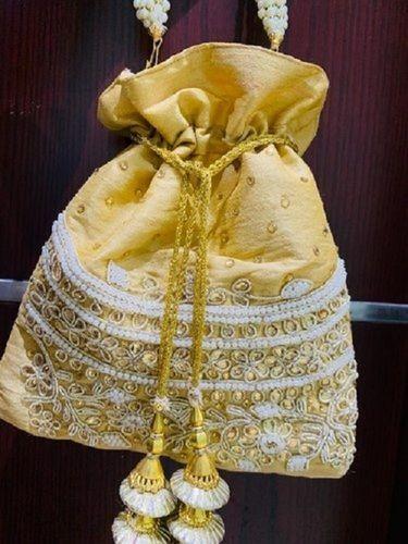 Comes In Various Colors Spacious, Bridal Embroidered Fancy Potli Bag With Drawstring Type Closure