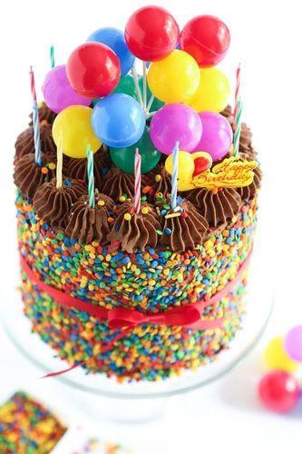 Round And Fancy Decorated Chocolate And Vanilla Birthday Cake