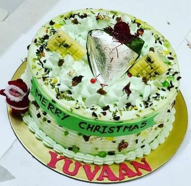 Elegant Look Excellent Taste Round Paan Flavored Eggless Christmas Cake (2 Kg) Shelf Life: 24 Hours