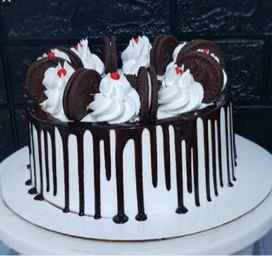 आकर्षक दिखने वाला मुंह में पानी लाने वाला स्वाद वाला गोल चॉकलेट ट्रफल केक क्रीम के साथ बिस्किट फैट में शामिल हैं (%): 0.3 ग्राम (G) 