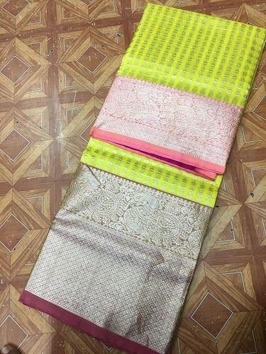 Party Wear Yellow Colour White Zari Silk Saree With Silver Colour Border And Attached Blouse