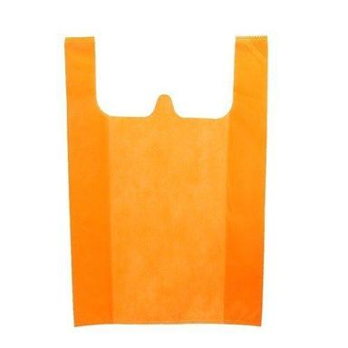Disposable Plain Orange Color Non Woven W Cut Bag For Grocery With Dimension 8.5' X 4.25' X 10.75'