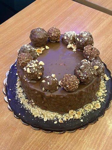 Piece Round Ferrero Rocher Chocolate Cake With 1 Week Shelf Life And Yummy Taste