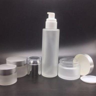 Transparent Light Weight Cosmetic Packaging Glass Bottle With Cap And Pump Full Set