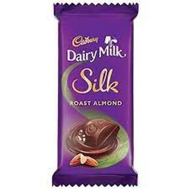 Multicolor Cadbury Dairy Milk Silk Chocolate, Smooth And Crunchy Whole Nuts With Roast Almonds