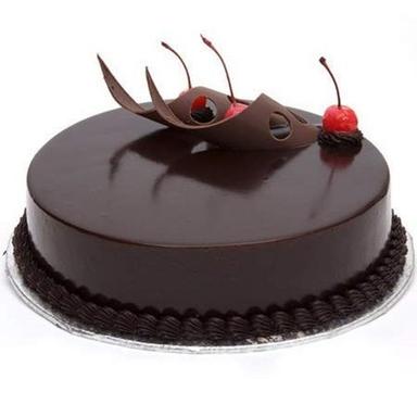 ब्राउन एग रहित स्वादिष्ट स्वादिष्ट और स्वादिष्ट गोल आकार का हेल्दी चॉकलेट केक