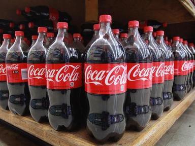 Regular Black Coca Cola Cold Drink Made With Natural And Healthy Fruit Juice And Sugar Packaging: Bottle