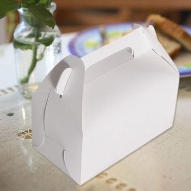  नॉन टॉक्सिक एलिगेंट लुक व्हाइट इको फ्रेंडली क्राफ्ट पेपर केक पैकेजिंग बॉक्स हैंडल के साथ 