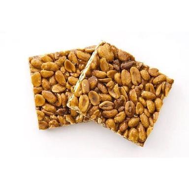 Mixture Of Jaggery And Peanuts Crumbly Glassy Crispy Sweet Peanut Chikki  Fat Contains (%): 19 Grams (G)