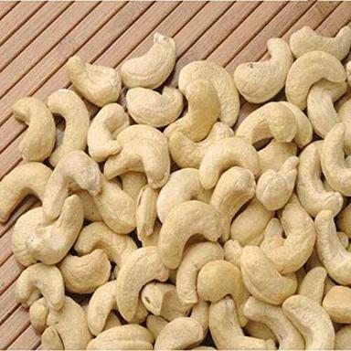 Cashew Nut For Food, Snacks And Sweets, Light Cream/Off White Color, Curve Shape Crop Year: Current Years