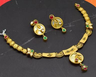 Gold Necklace Set With Gold Earrings For Party Wear