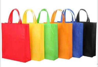  हैंडल के साथ पीला प्लेन मल्टीकलर प्लास्टिक शॉपिंग कैरी बैग