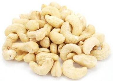 Off White Cashew Nuts Use In Food Snacks And Sweets, High In Colories Application: Industrial