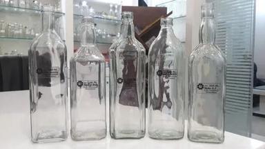 Round Lightweight Rigid Hardness Transparent Flint Glass Empty Bottle Size: Customized