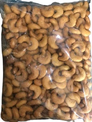 Fried And Crispy Salty Taste Maida Kaju Snacks, 500 Gram Pack Packaging: Bag
