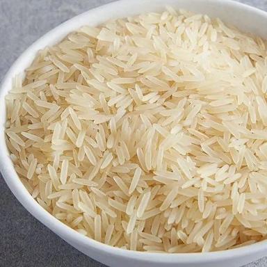 Soft Texture Long Grain Light Golden Yellow Basmati Rice For Cooking Capacity: 150 Ton/Day