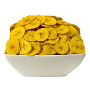 Yellow Round Shape Hygienically Packed Fried Salty Banana Chips Packaging Size: 1 Kg