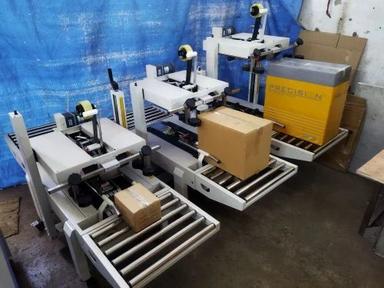 Carton Box Tapping Machine