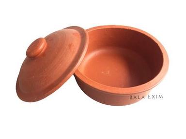 Polishing Red Clay Bowl With Lid