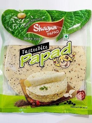 Delicious Taste Round Yellow Spicy And Salty Masala Papad Food Grade: Snack