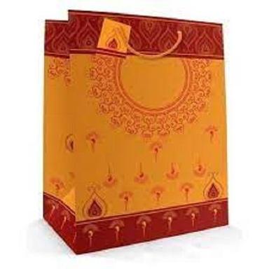 Biodegradable Yellow And Red Color Printed Art Paper Bags For Clothing And Books