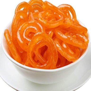 Sweet Jalebi Formed With Batter Of Besan Flour Bicarbonate Of Soda And Water  Carbohydrate: 5.6 Grams (G)